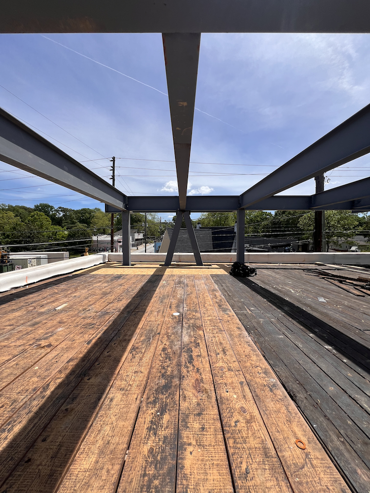 Close-up view of wood decking being replaced on 918 Dill Ave.